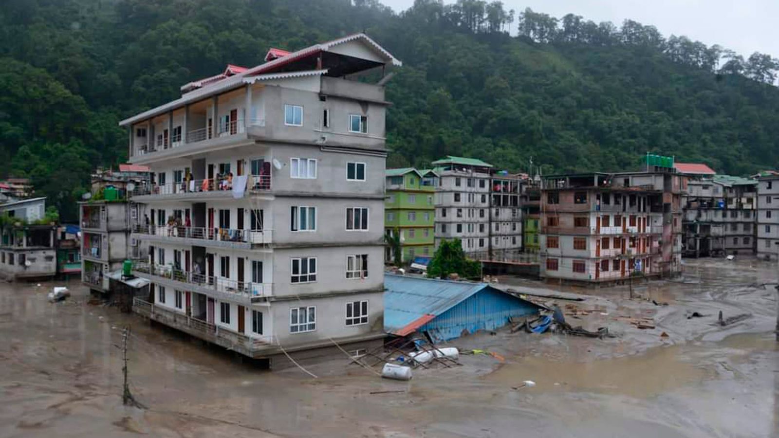Floods wash away 11 bridges in India: dozens of people killed. Photo