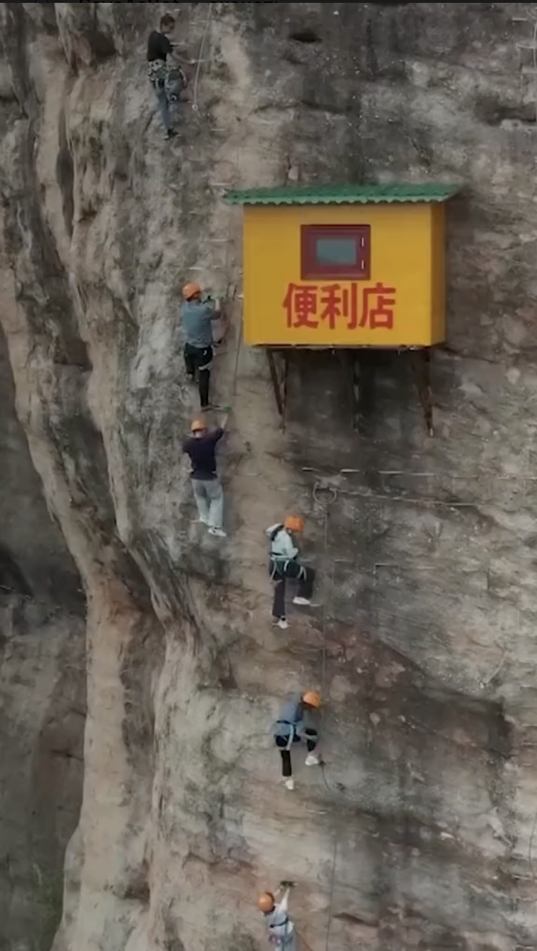 What the "most inconvenient store" in China, hanging off a cliff, looks like
