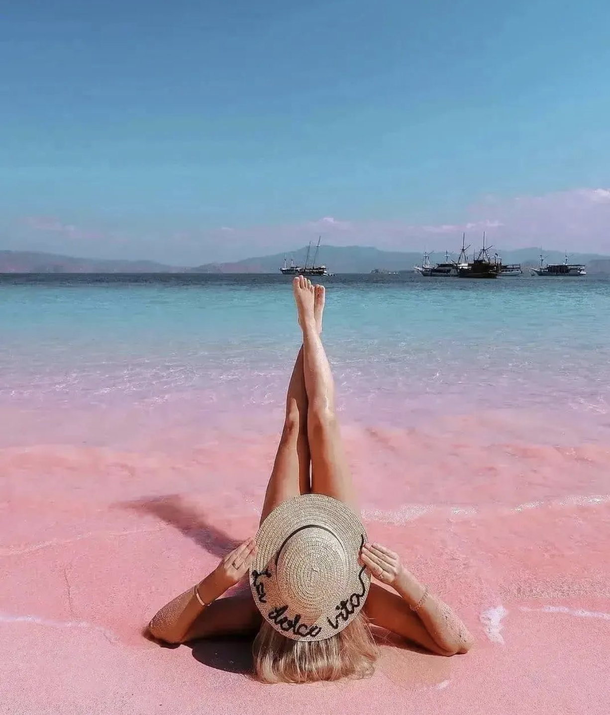 The sand on the beach in Indonesia is bright pink