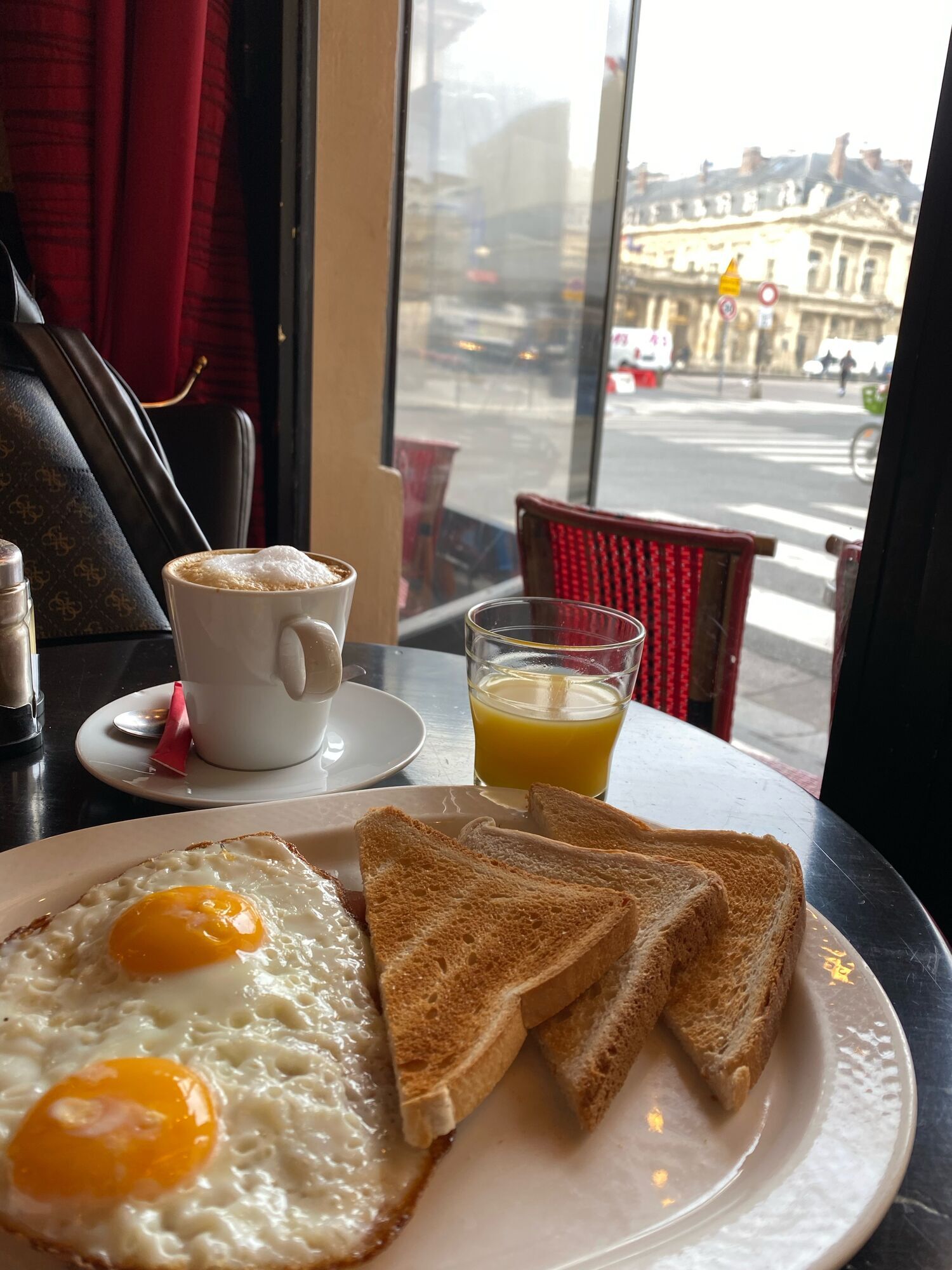 Cappuccino and scrambled eggs - a classic Parisian breakfast