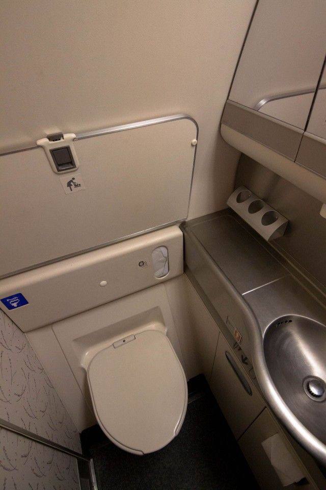 A hygienic way to use restroom on an airplane