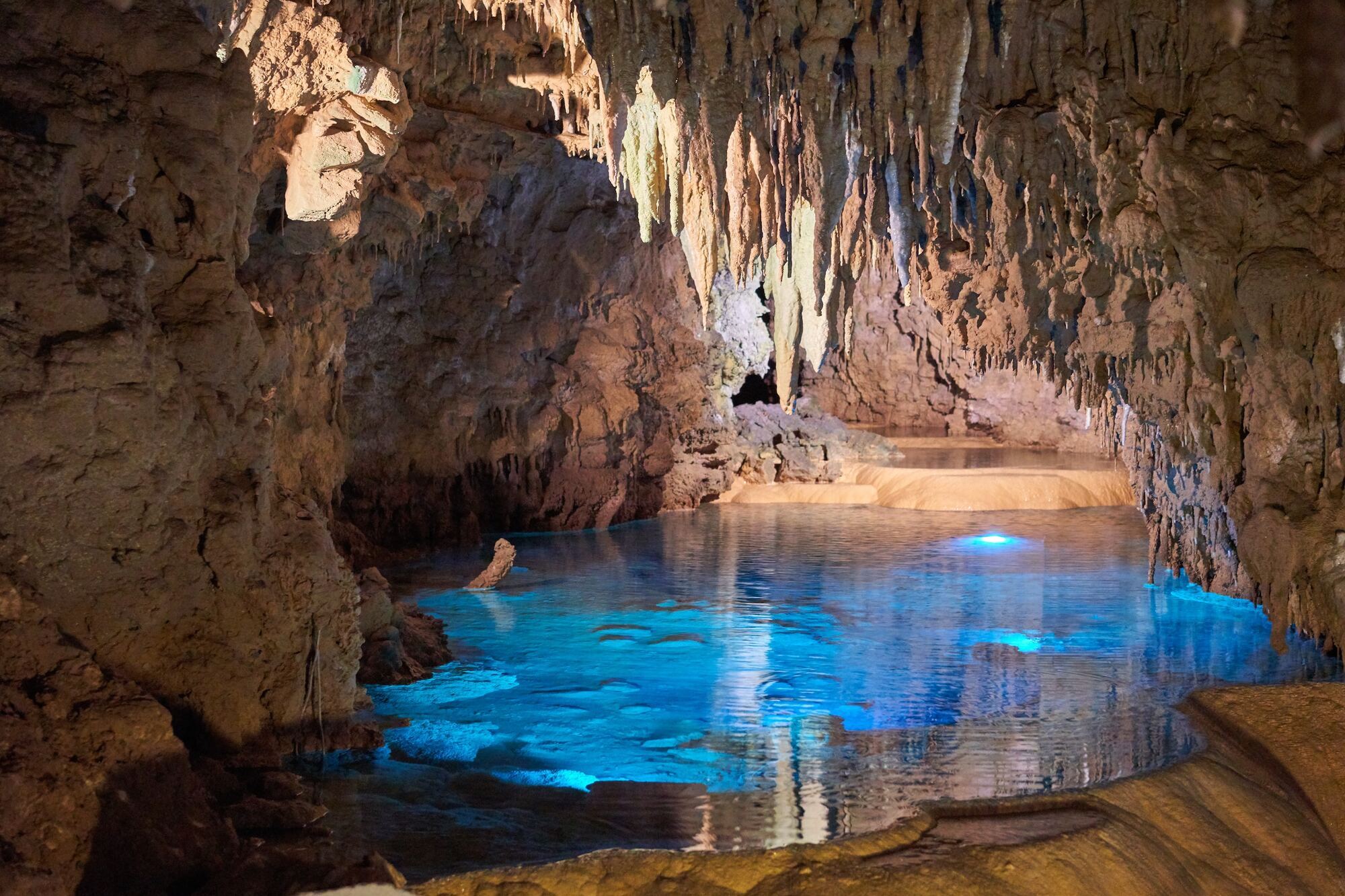 <span style="font-weight: 400;">limestone cave with water</span>