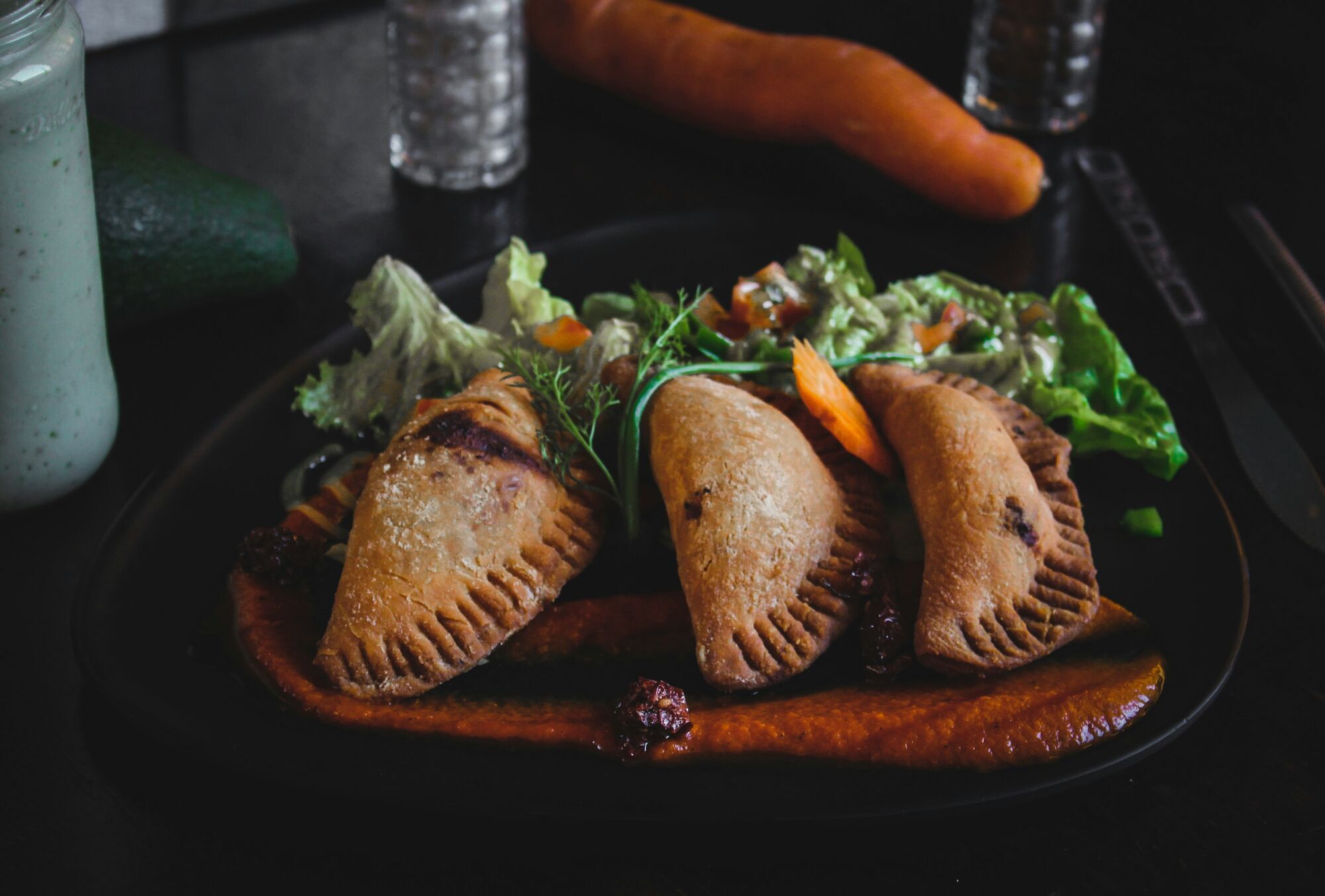 fried dumplings served on plate