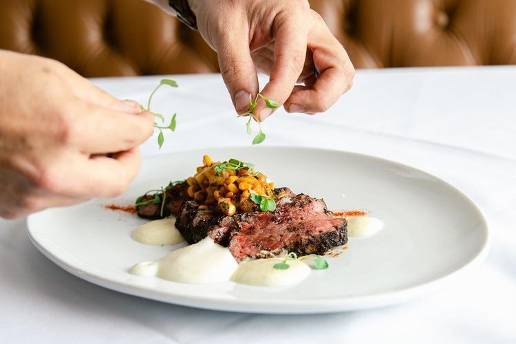 Expertly plated steak dish at Selanne Steak Tavern