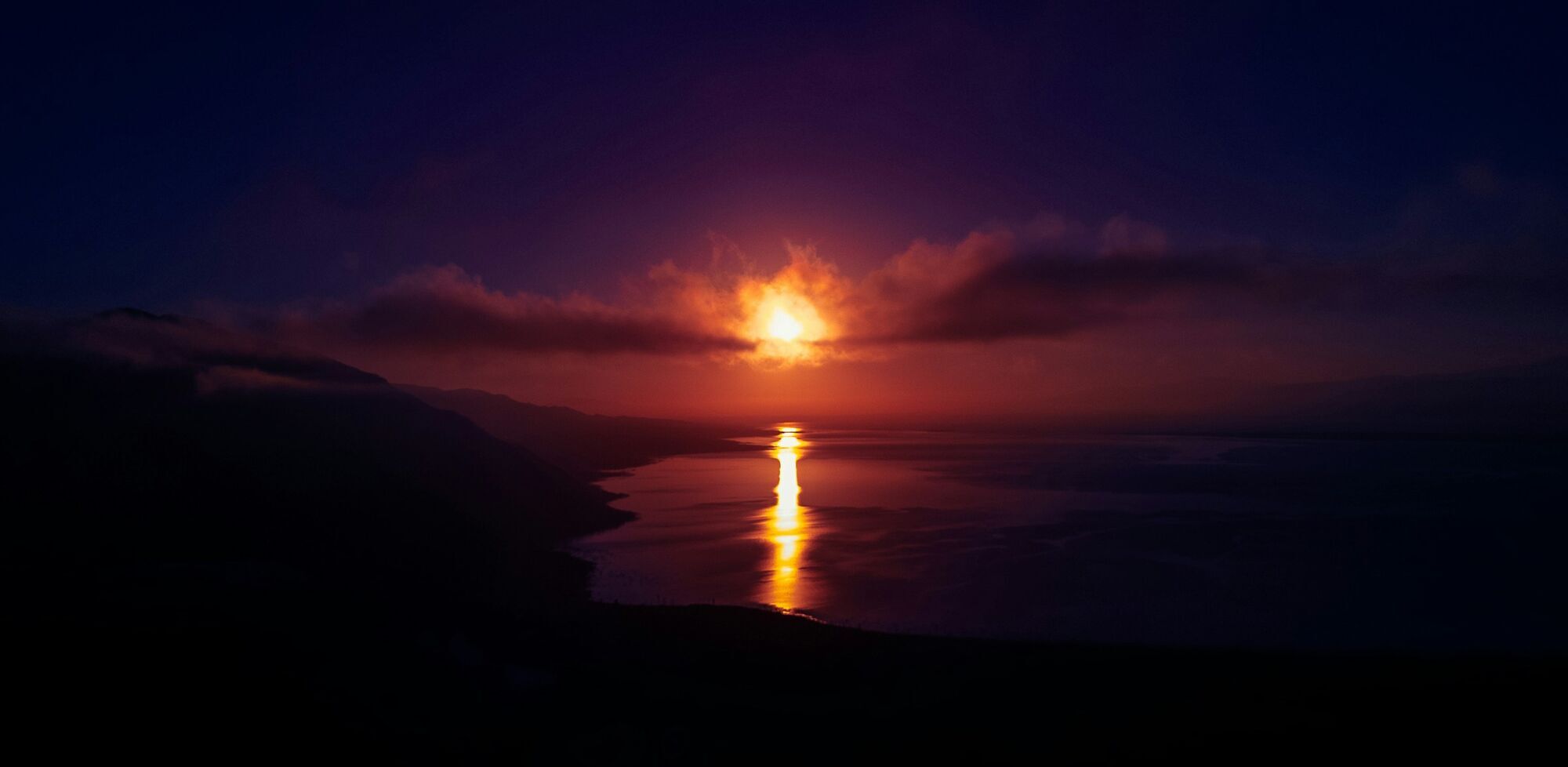 Sunset over Lake Enriquillo with vibrant colors