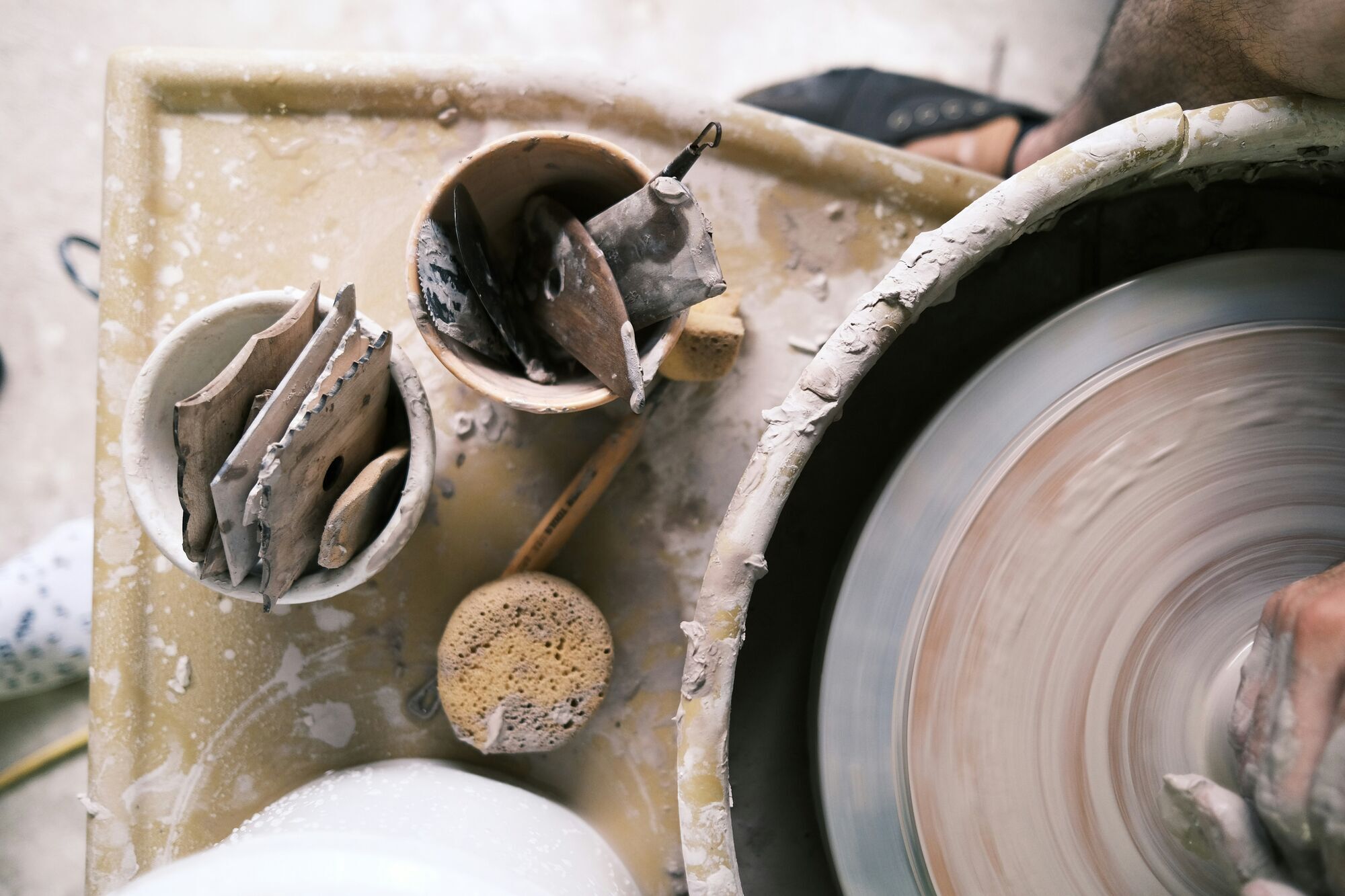 Working with stoneware clay on a Brent wheel