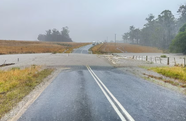 Tasmania's east coast flooded after heavy rains and lightning: photos