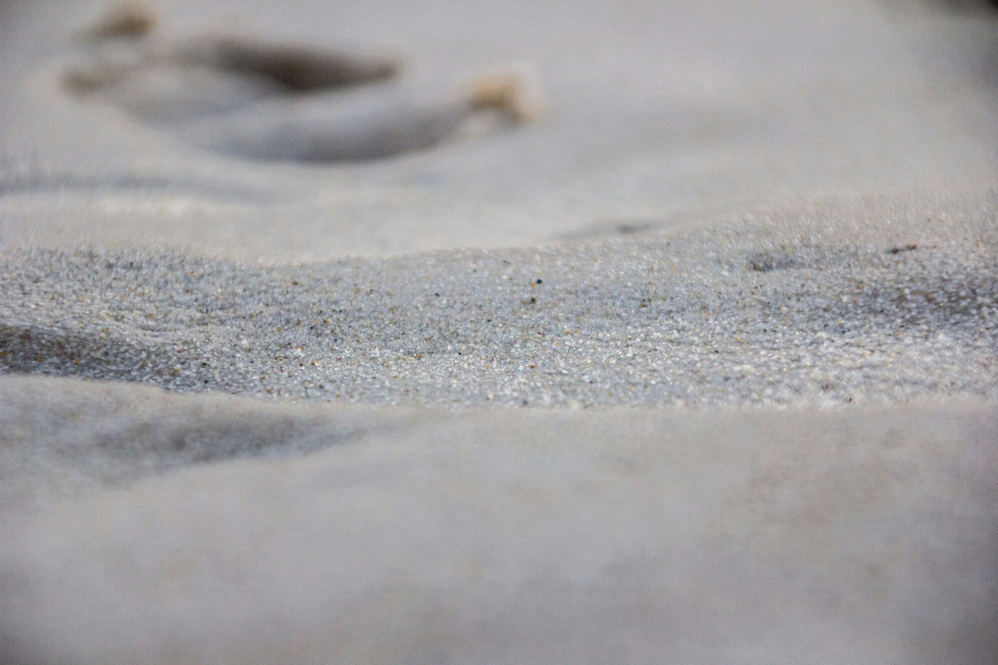 <span style="font-weight: 400;">Close-up of the textured sand at Squeaky Beach, Victoria, Australia</span>
