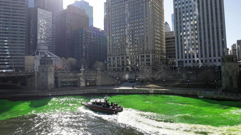 In honour of St. Patrick's Day, Chicago River traditionally painted green. Fascinating video