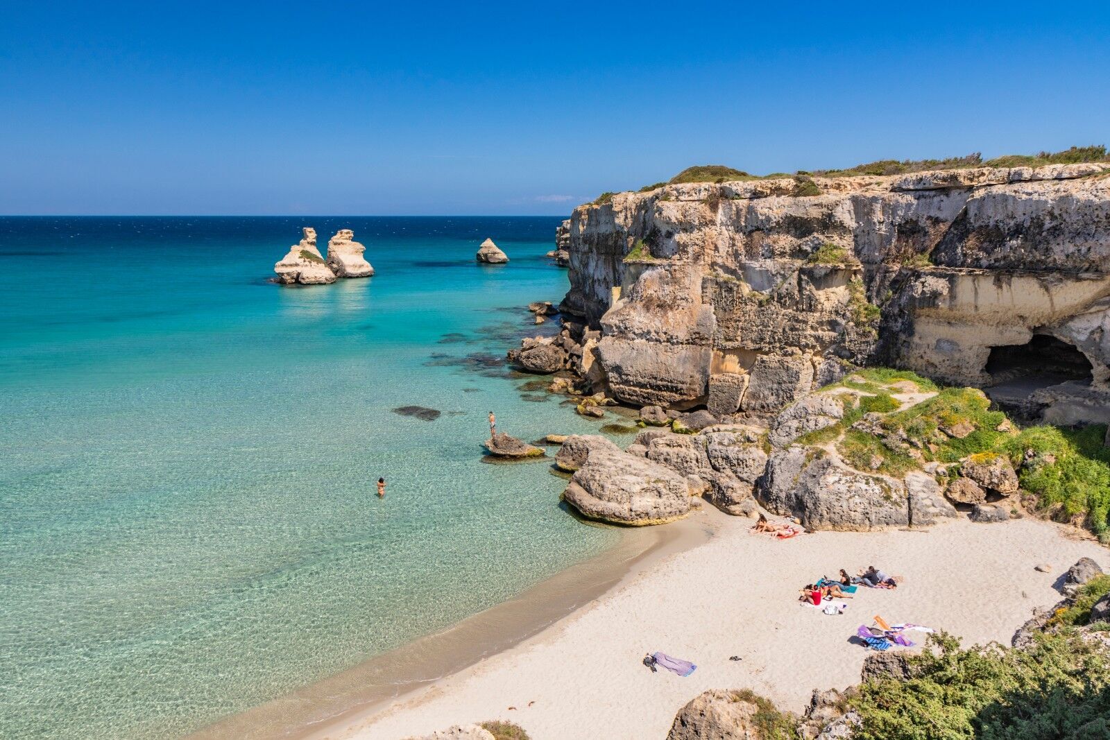 Italy's Best Beaches: From Pristine Sands to Dramatic Cliffs