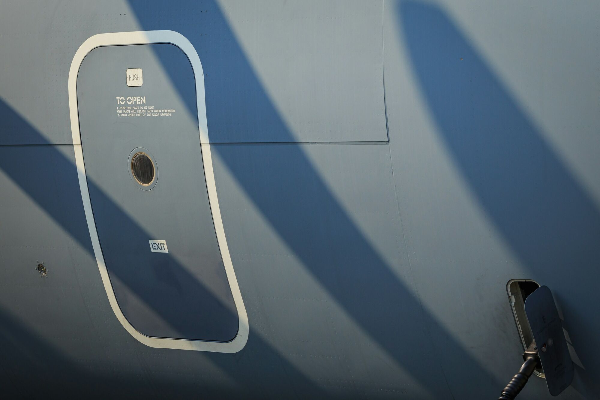 Airplane emergency exit door on the exterior of the aircraft