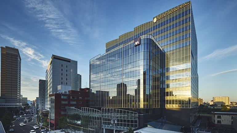 InterContinental Sapporo hotel building with glass facade reflecting the city skyline