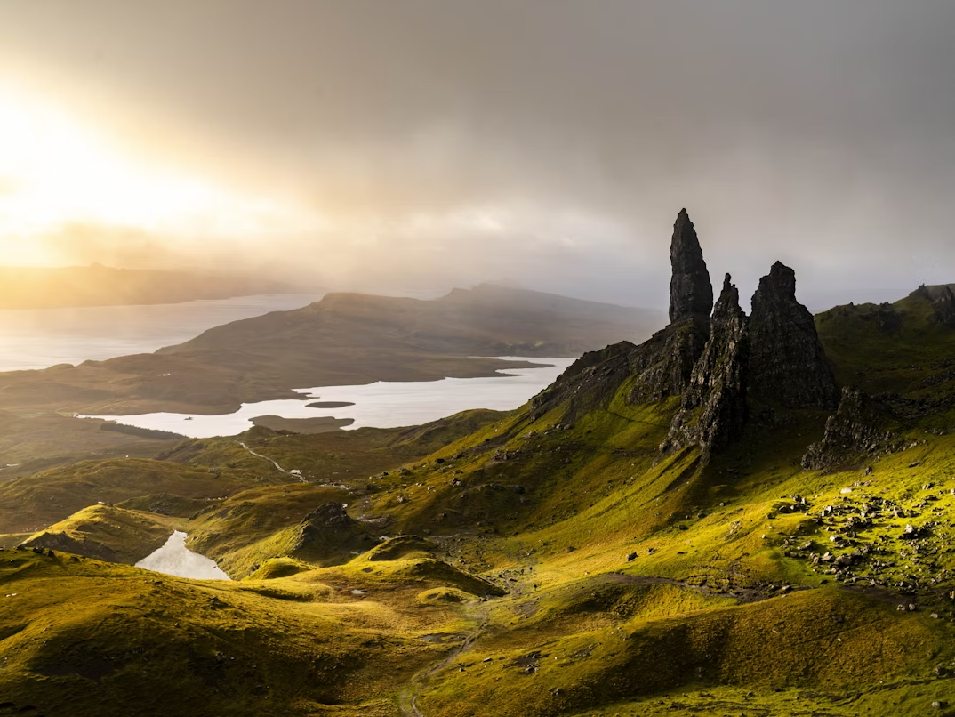 Sunrise over the rugged landscape of the Isle of Skye with rock formations and lochs