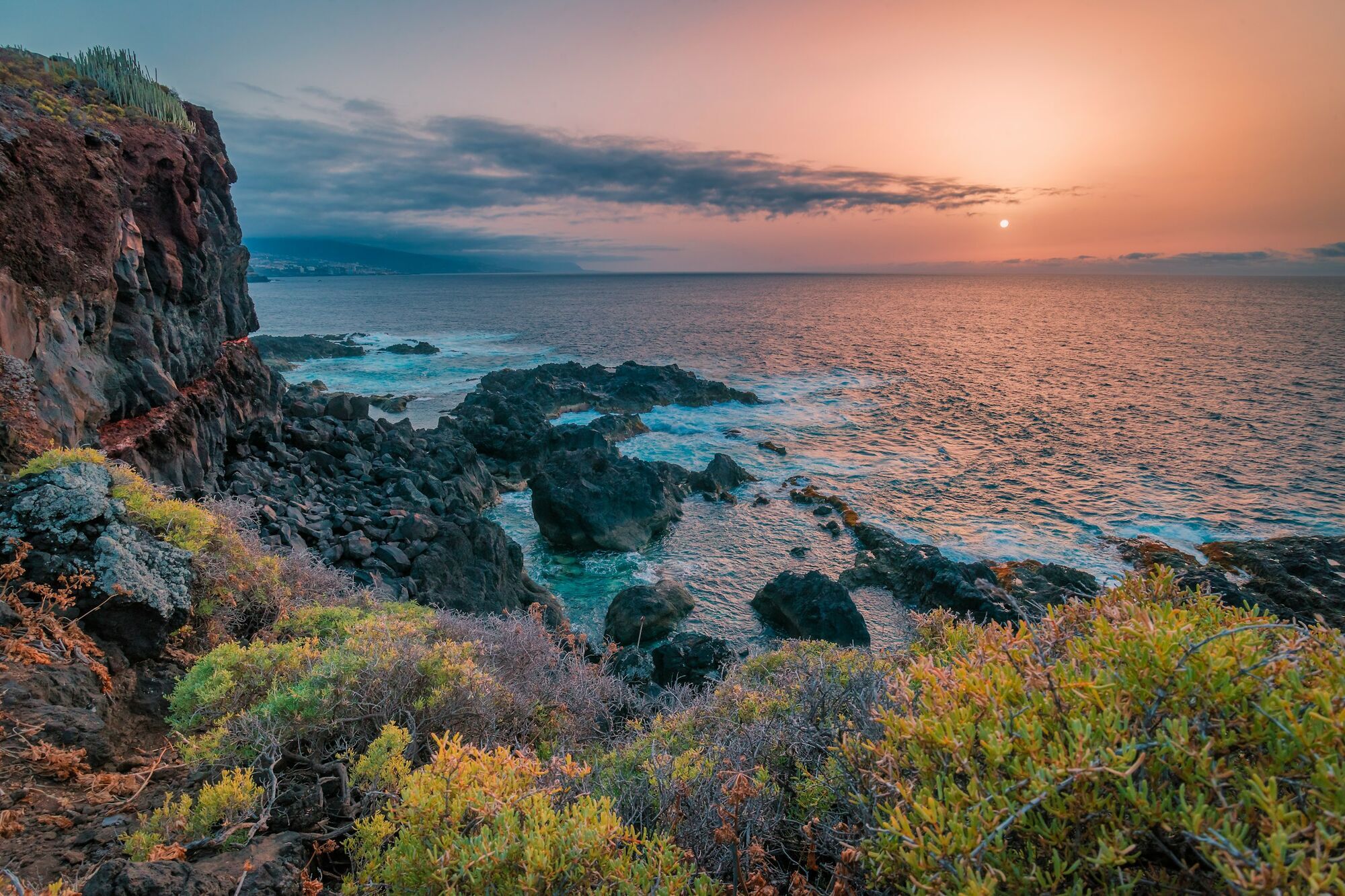 Sunset over the rocky coastline of the Canary Islands