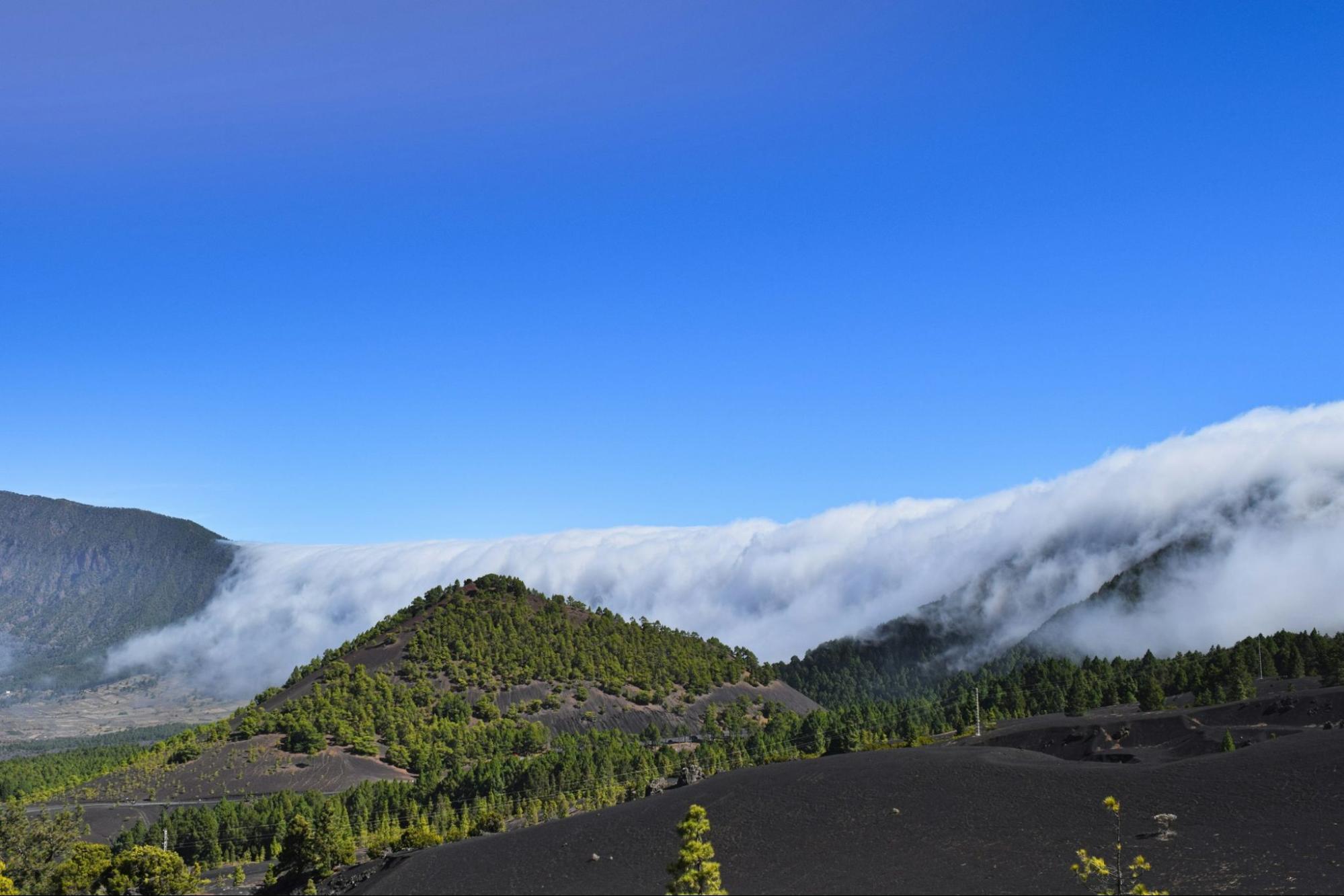 Volcanic hills and clouds on La Palma island, Spain