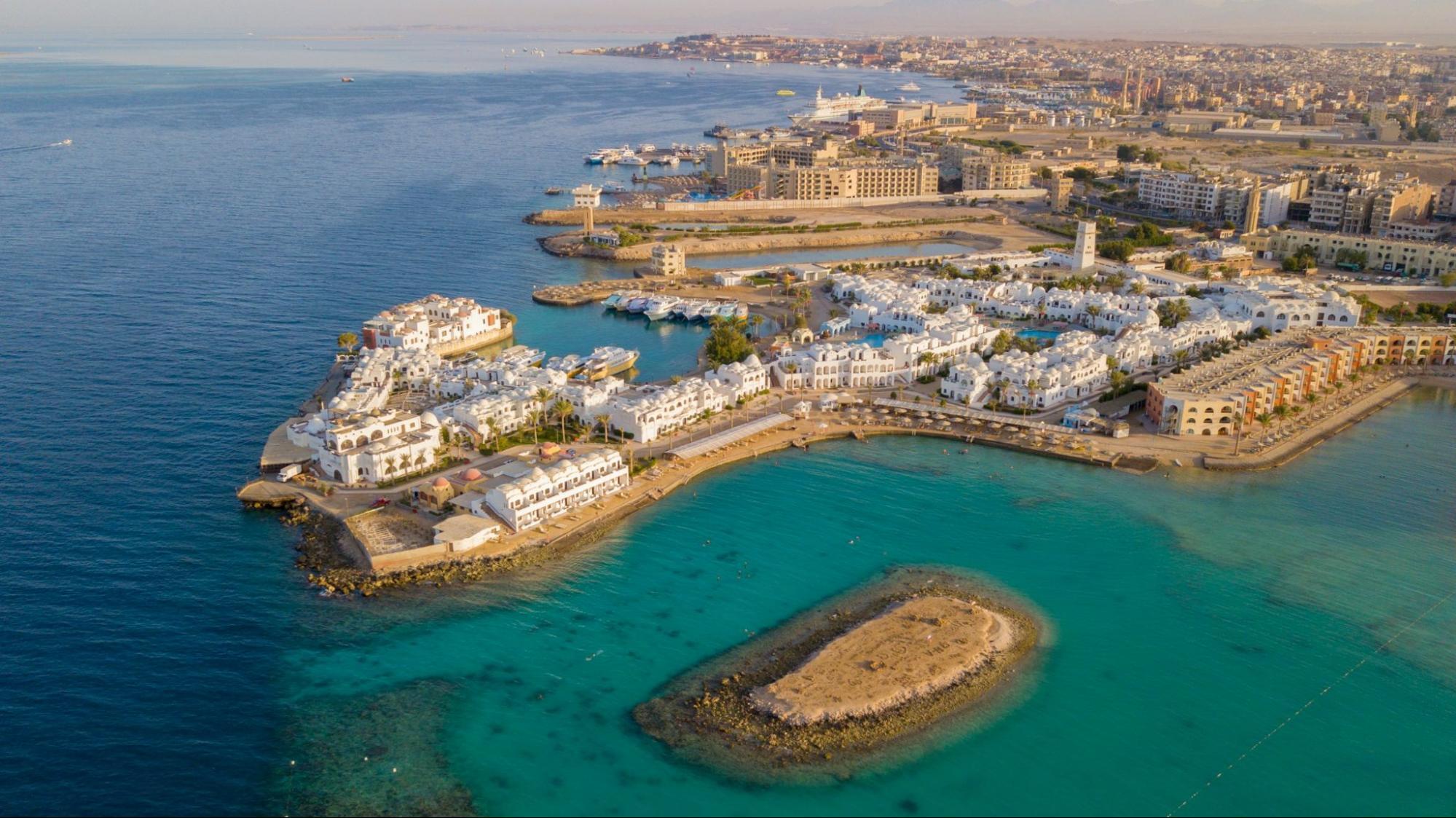 Aerial view of Hurghada’s coastline with turquoise water and seaside resorts