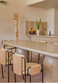 Modern dining area with neutral tones and minimalist design