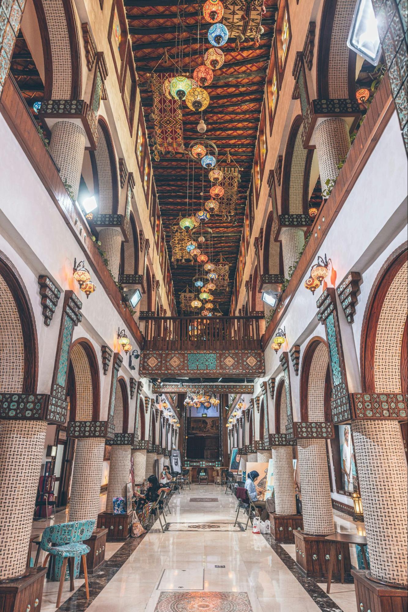 Traditional indoor market hall in Doha decorated with colorful lanterns