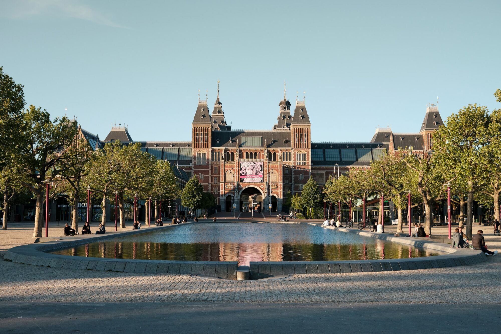 View of the Rijksmuseum and the pool at Museumplein in Amsterdam