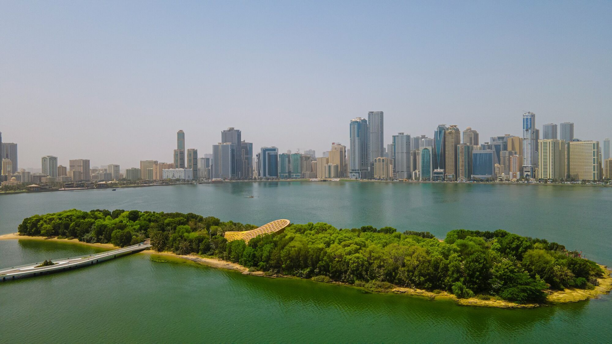 Al Noor Island and Sharjah skyline across the lagoon