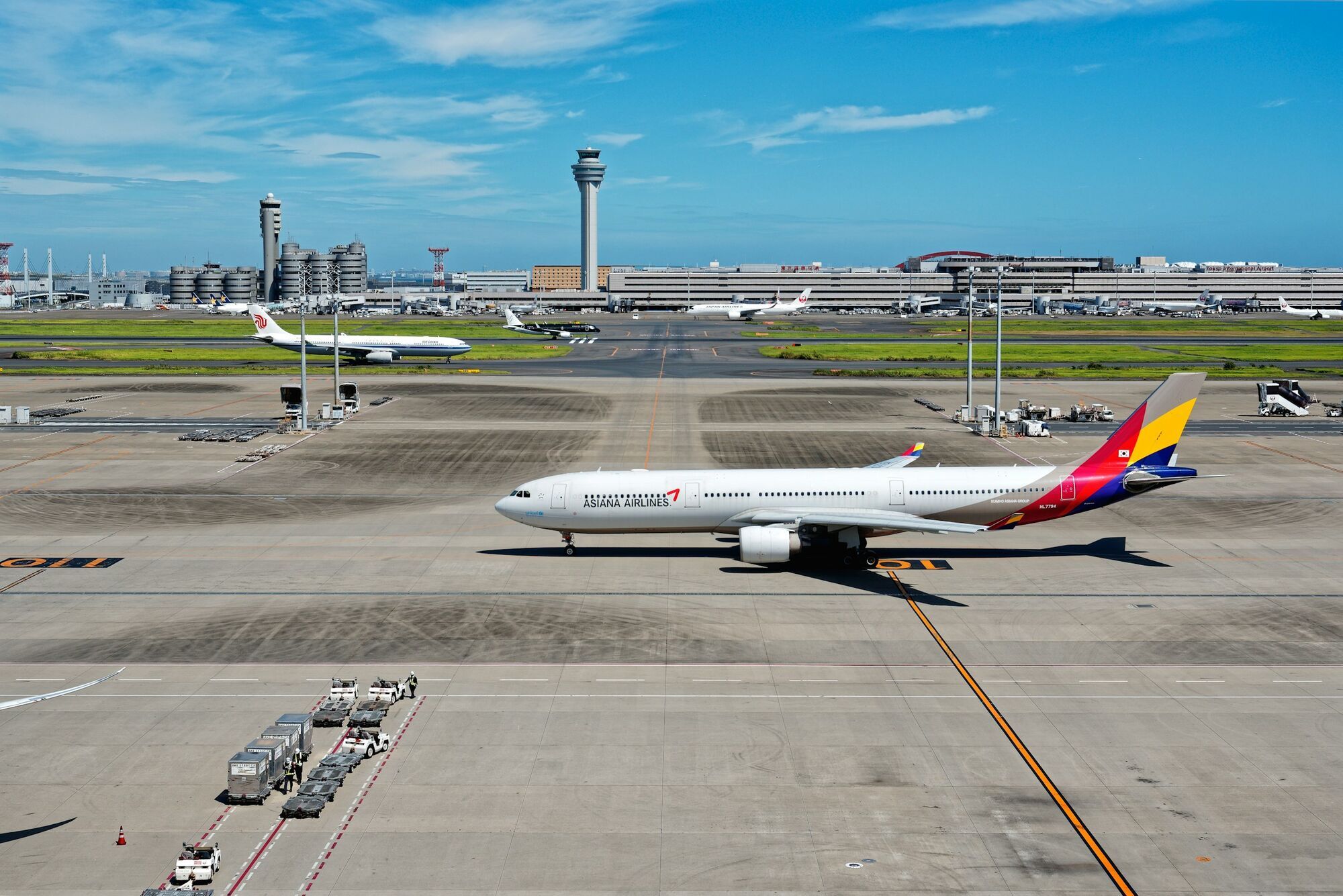 Asiana Airlines aircraft taxiing at an international airport