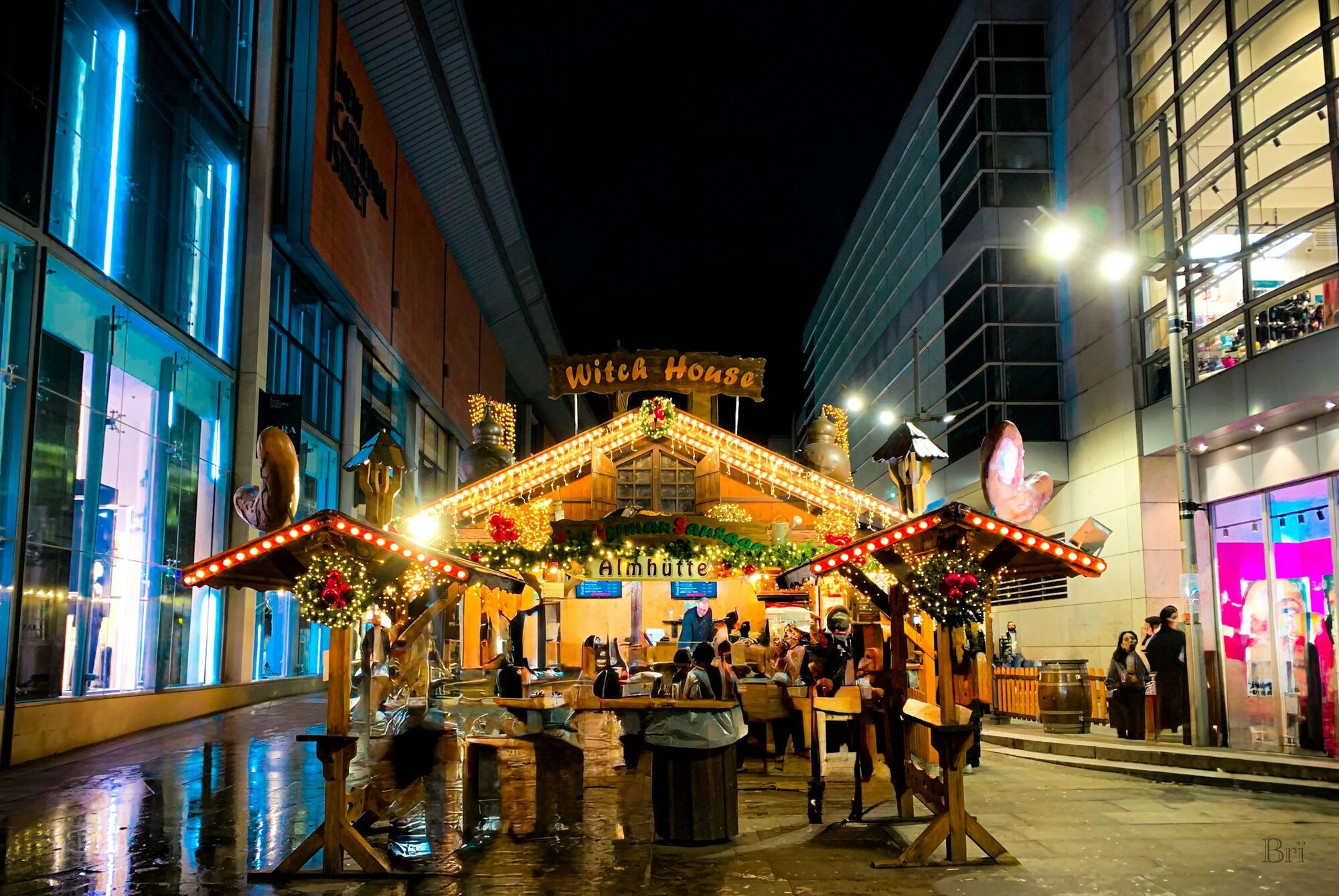 Christmas market stall in central Manchester at night