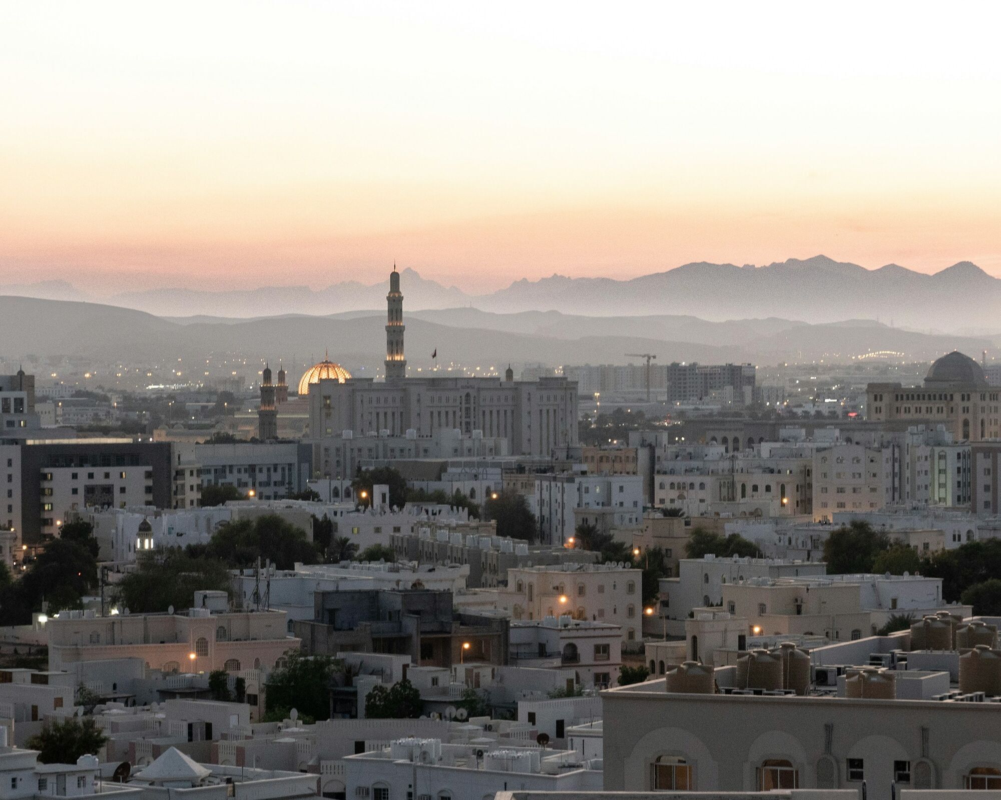 City skyline of Muscat at sunset