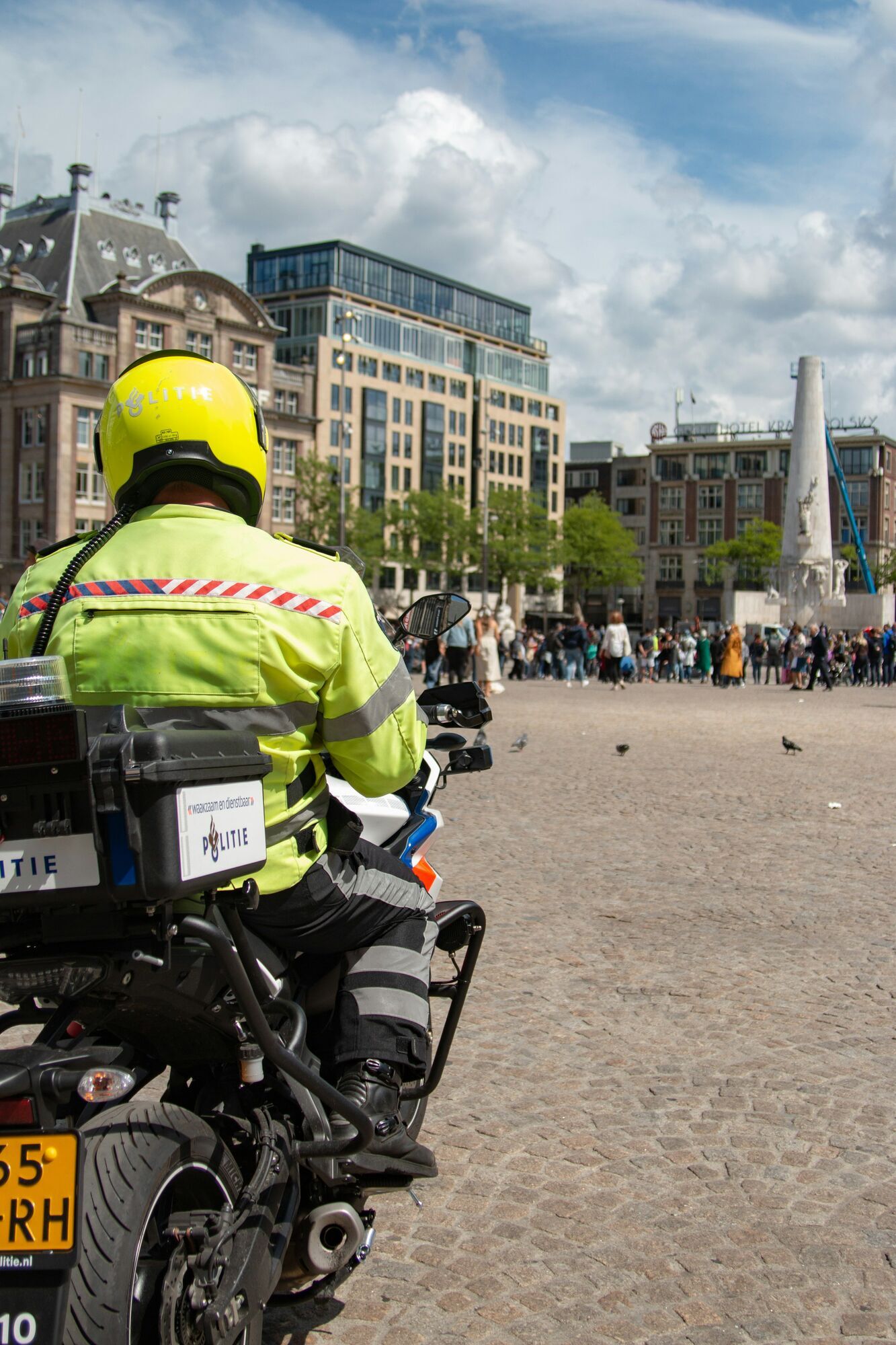 Police officer on a motorcycle at Dam Square in Amsterdam
