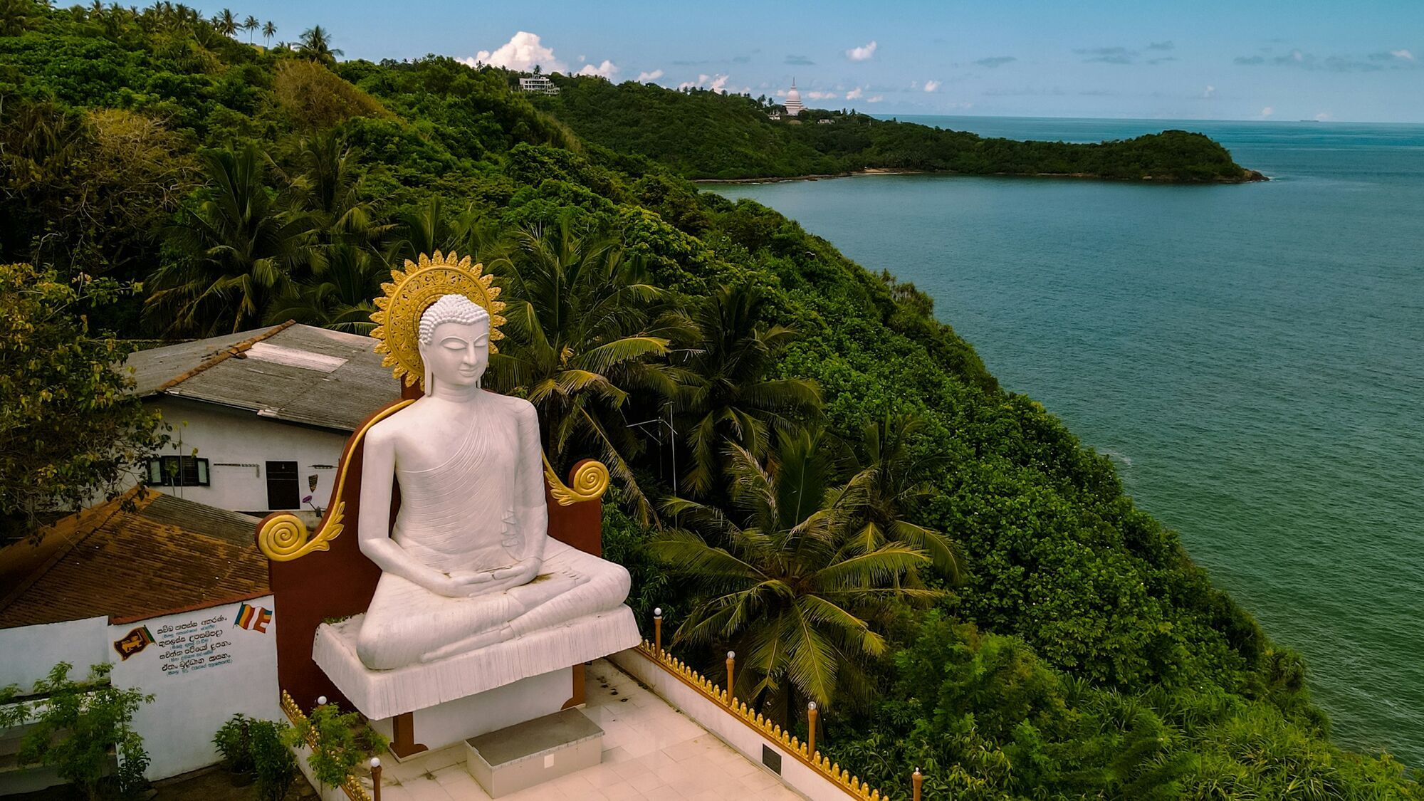 Buddha statue overlooking Sri Lanka coastline