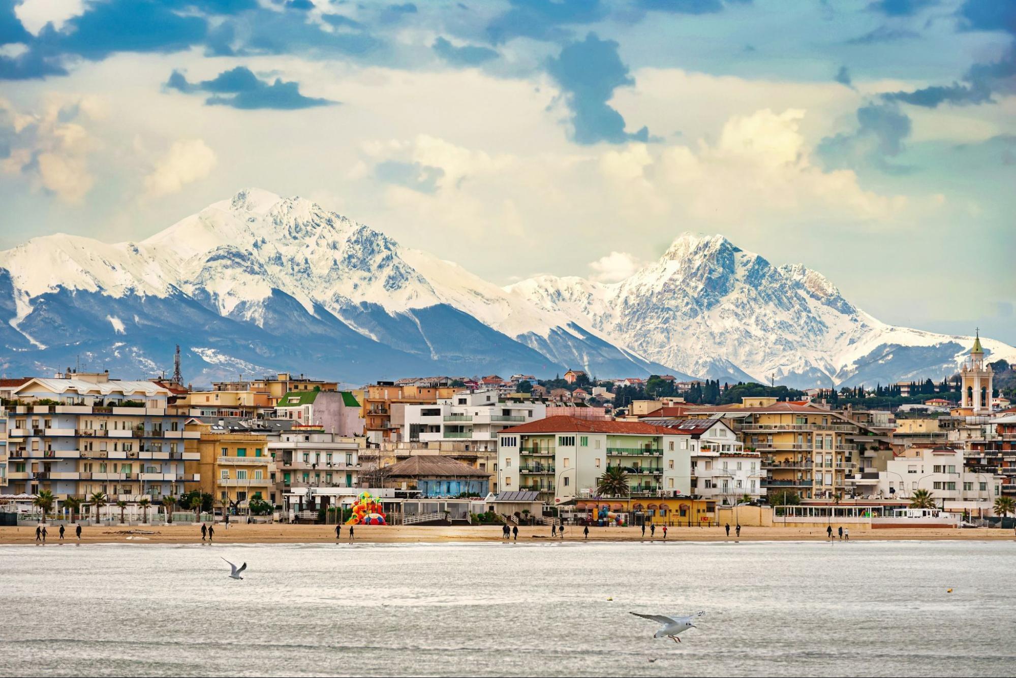 Pescara on Italy’s Adriatic coast with the Apennine mountains behind the city