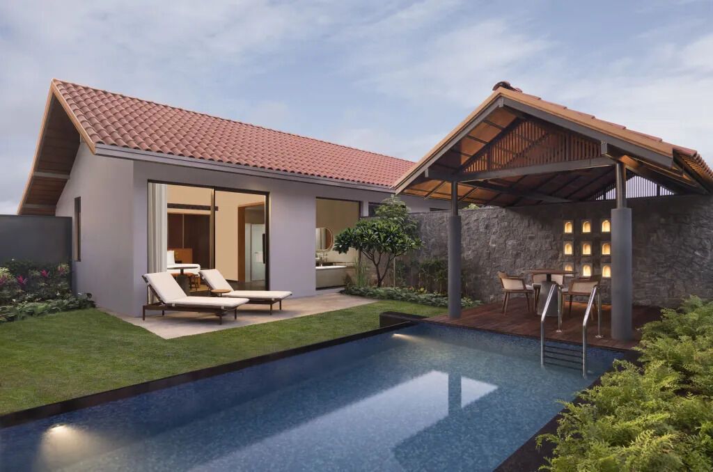 Private villa with pool and outdoor seating at a resort