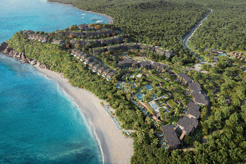 Aerial view of beachfront resort surrounded by lush greenery on the Papagayo Peninsula