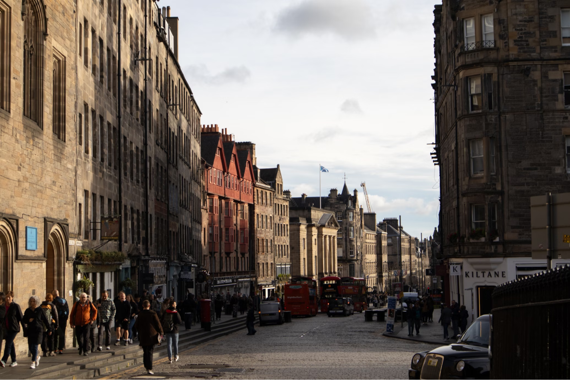 View of Edinburgh’s Royal Mile with pedestrians and historic buildings