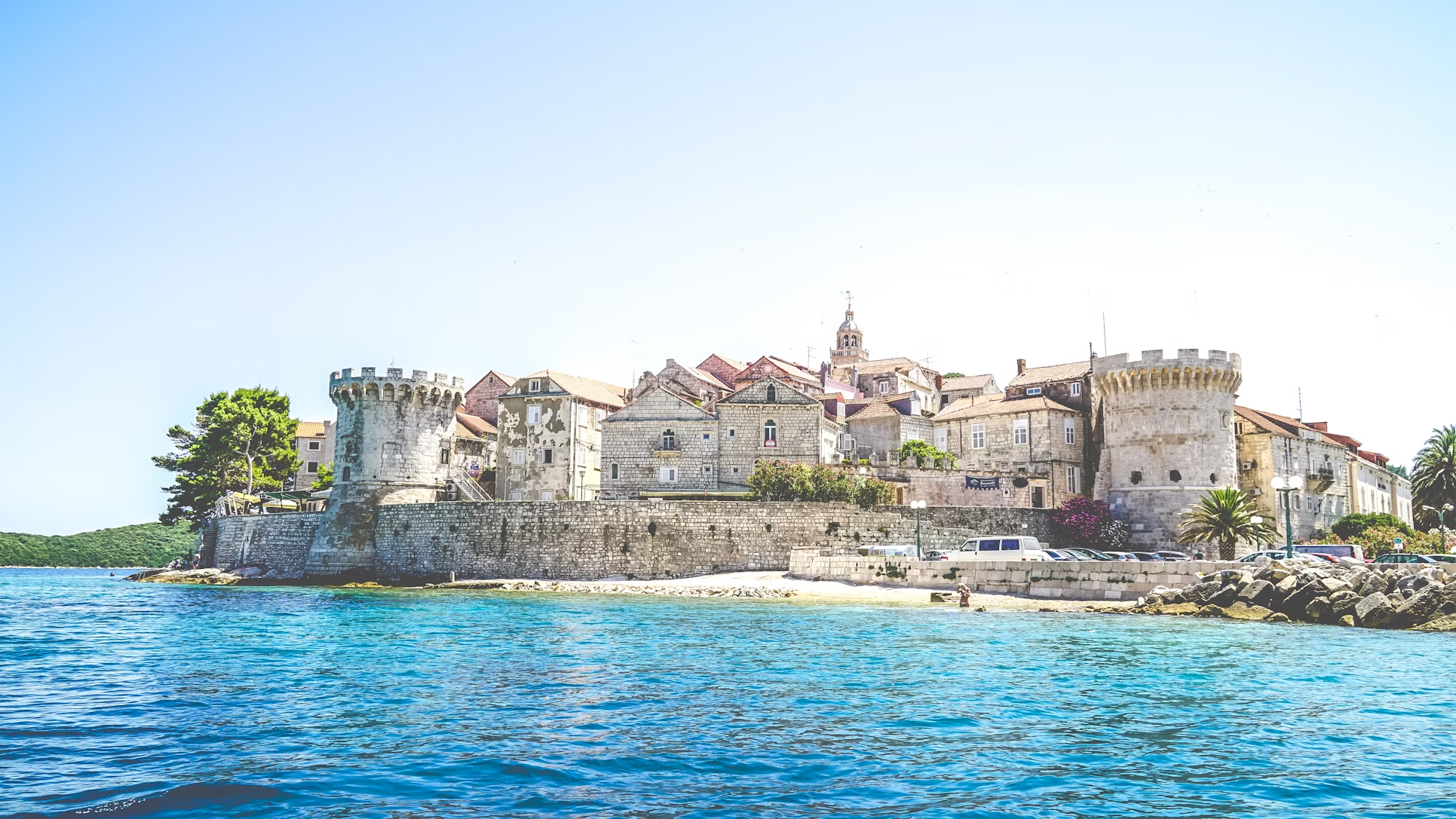 Historic coastal buildings and towers of Korčula viewed from the sea