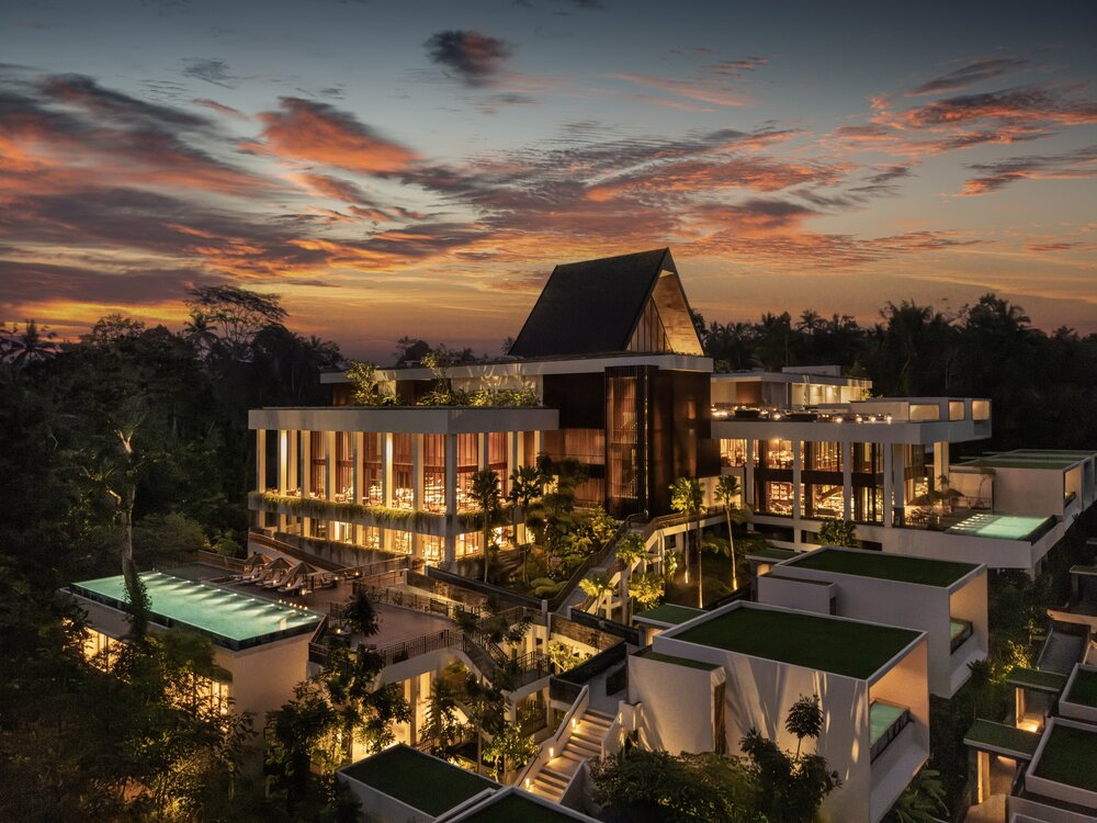 Modern resort in Ubud, Bali surrounded by trees at sunset