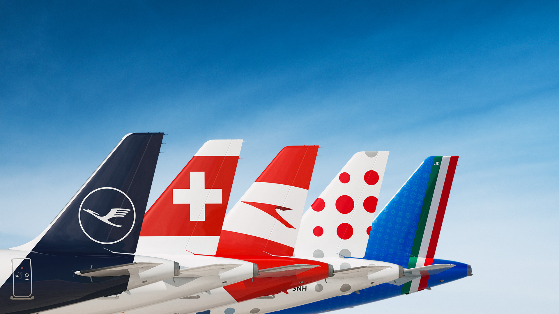 Aircraft tails of Lufthansa, SWISS, Austrian, Brussels Airlines and ITA Airways lined up