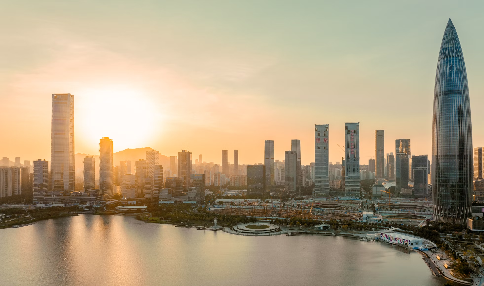 Shenzhen city skyline at sunset with waterfront view