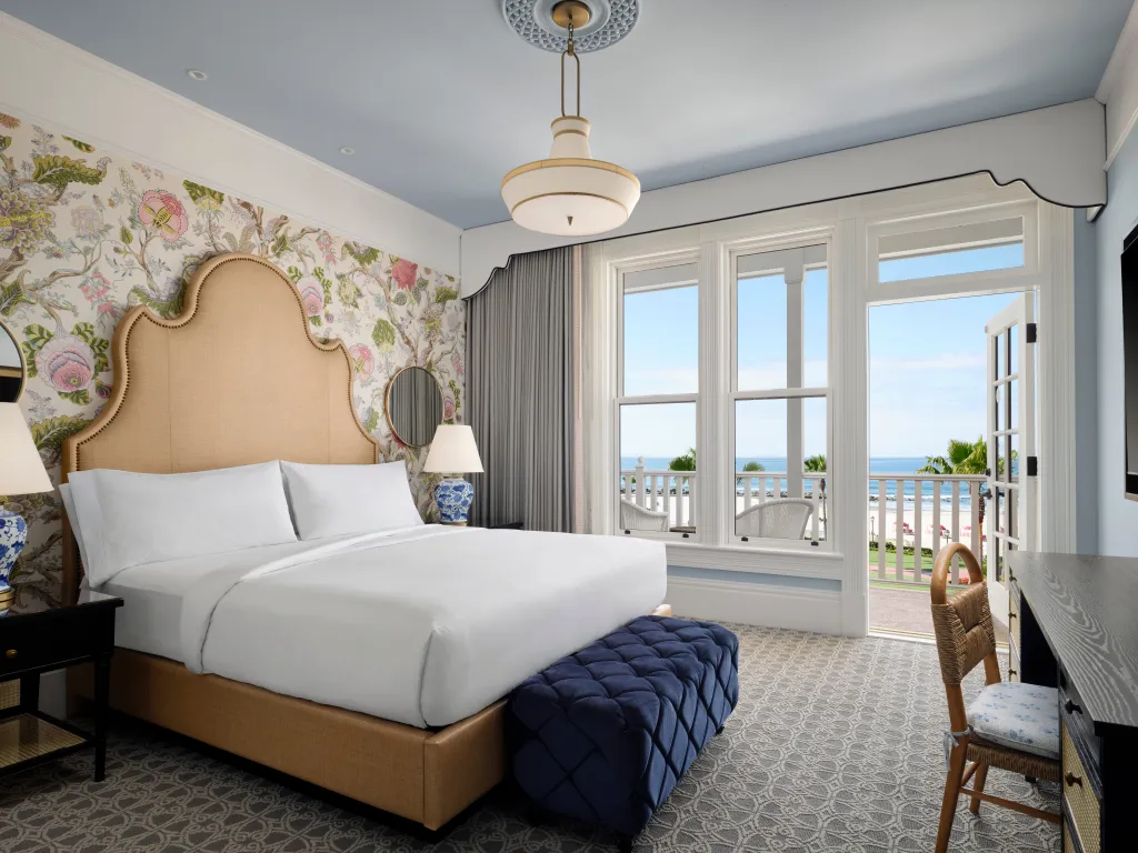 Victorian-style hotel room with ocean view balcony
