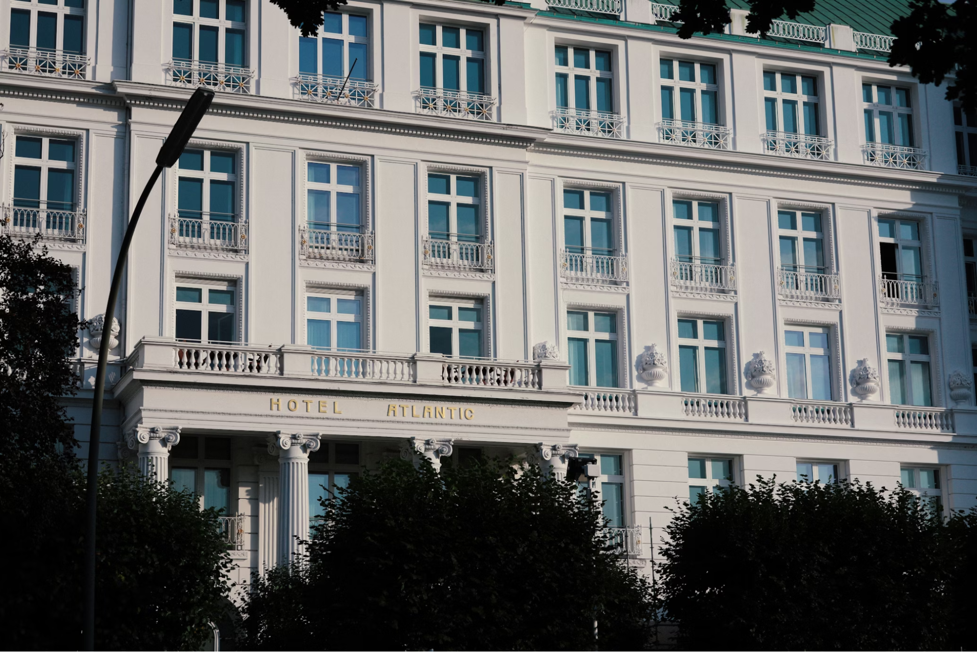 The Atlantic Hotel building with classic white façade and multiple windows