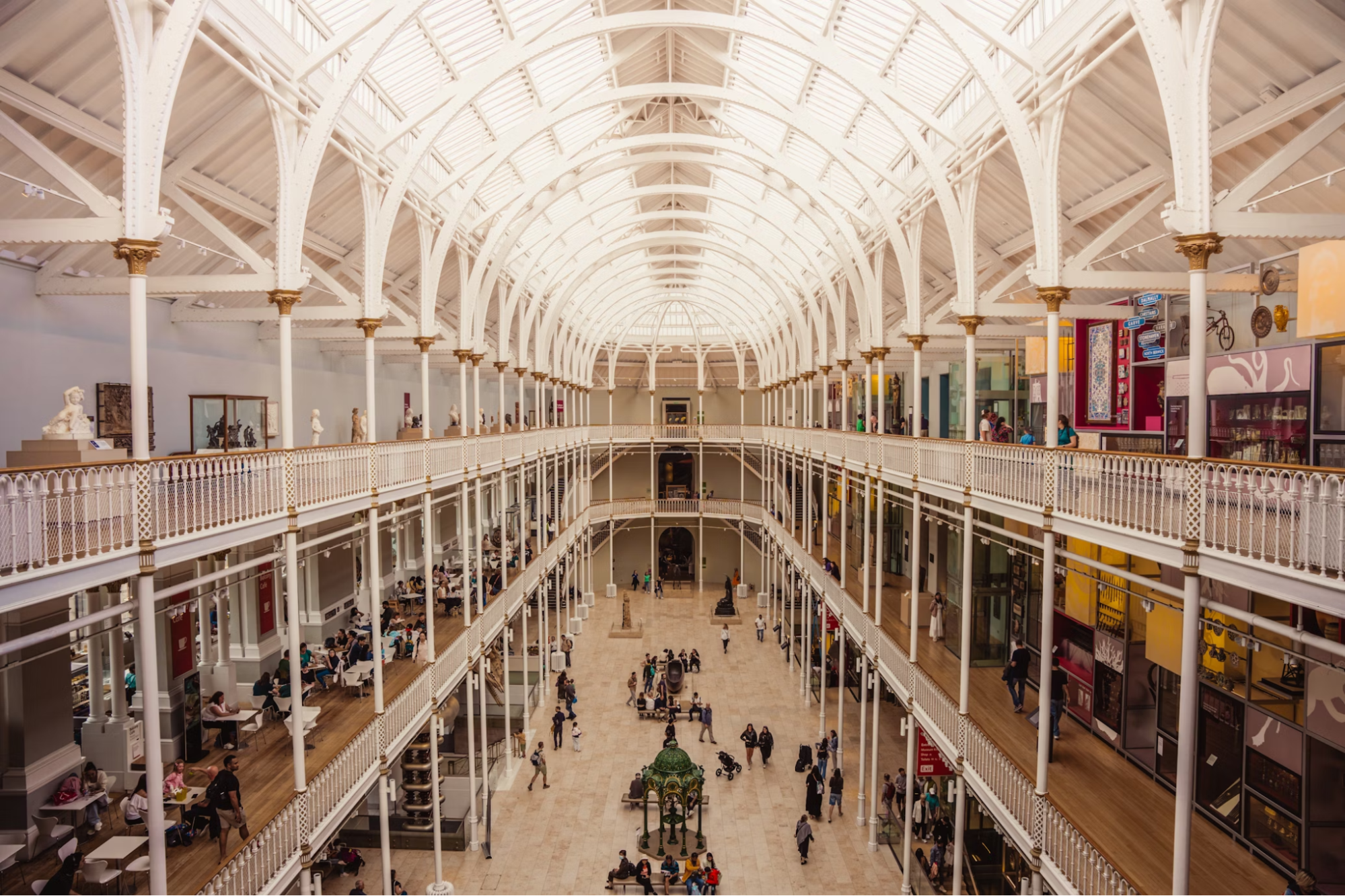 Interior view of the National Museum of Scotland with visitors exploring exhibits