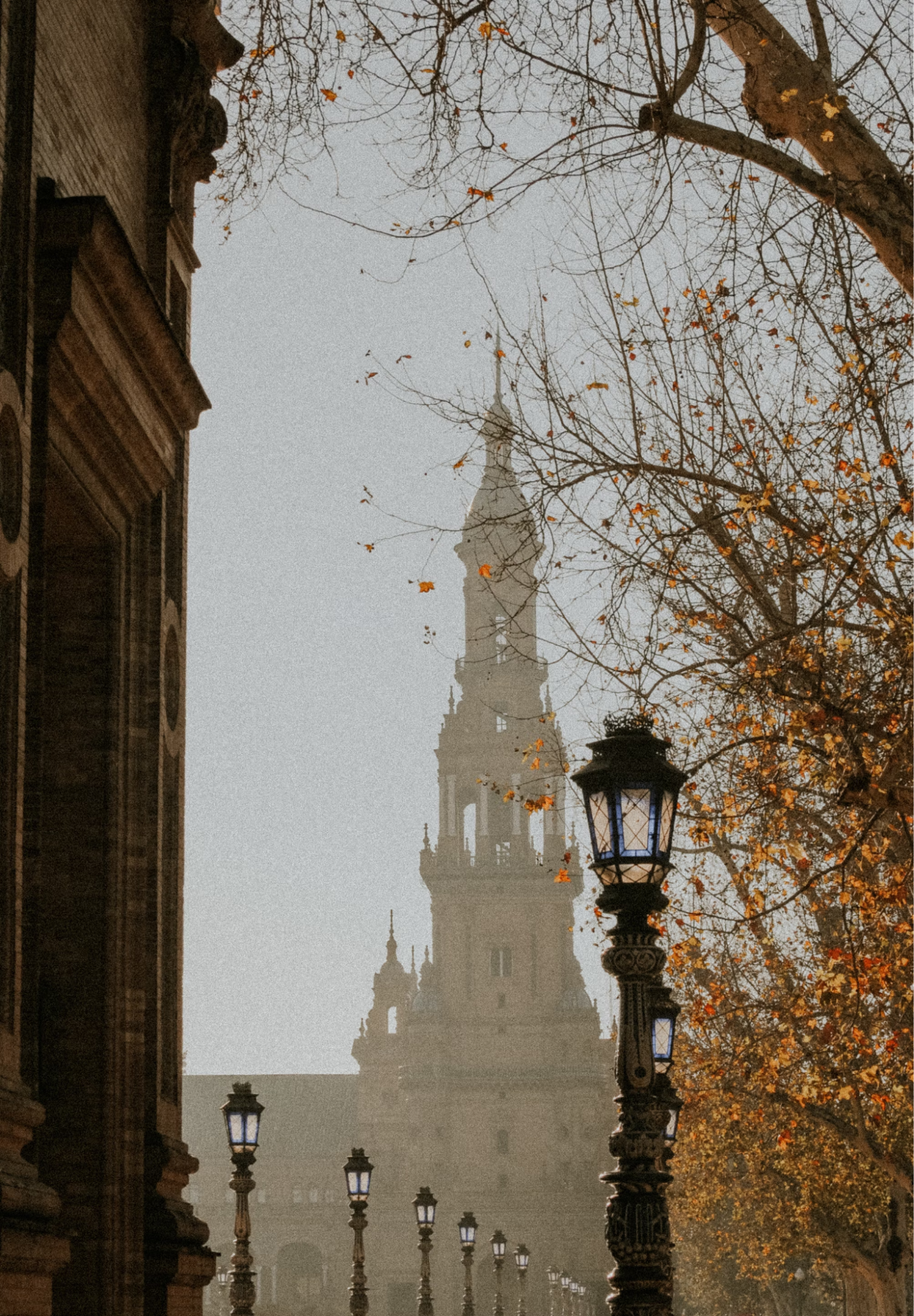 View of Seville’s Plaza de España tower in late autumn light
