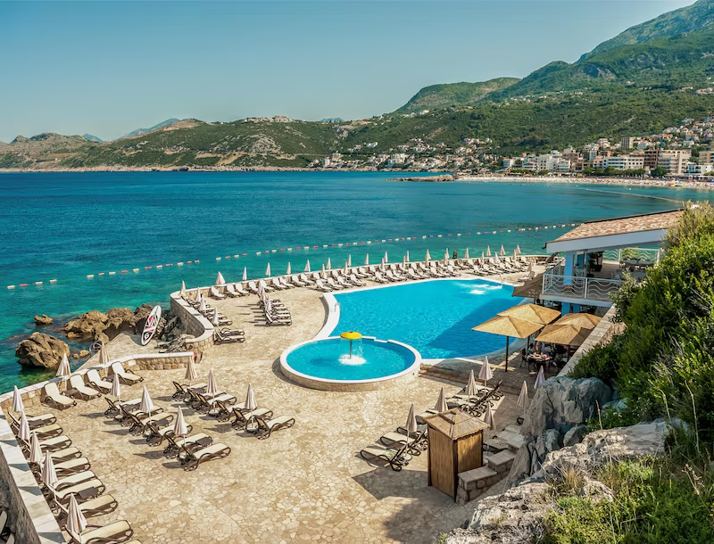Outdoor swimming pools and sun loungers with Adriatic Sea view at Radisson Resort Ruža Vjetrova