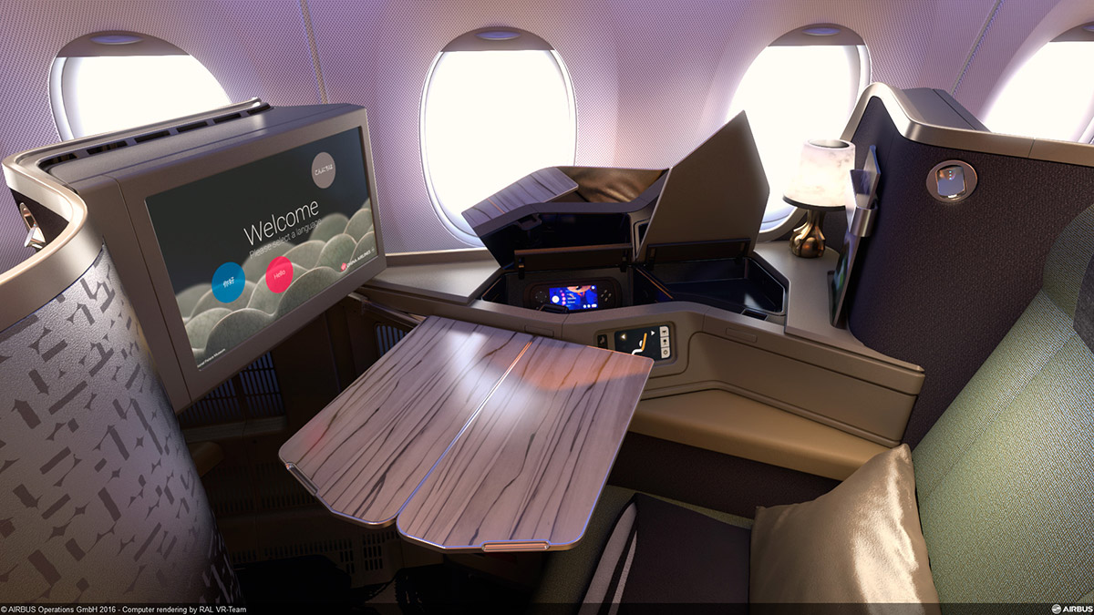 Business class seat with personal screen and folding table on China Airlines aircraft