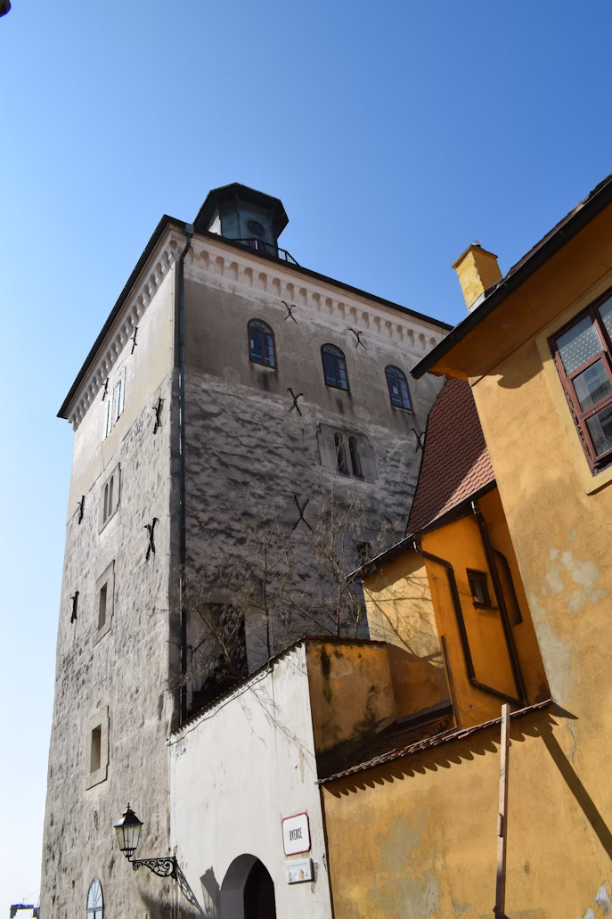 Old tower building with windows and lantern in Zagreb’s Upper Town under a clear blue sky