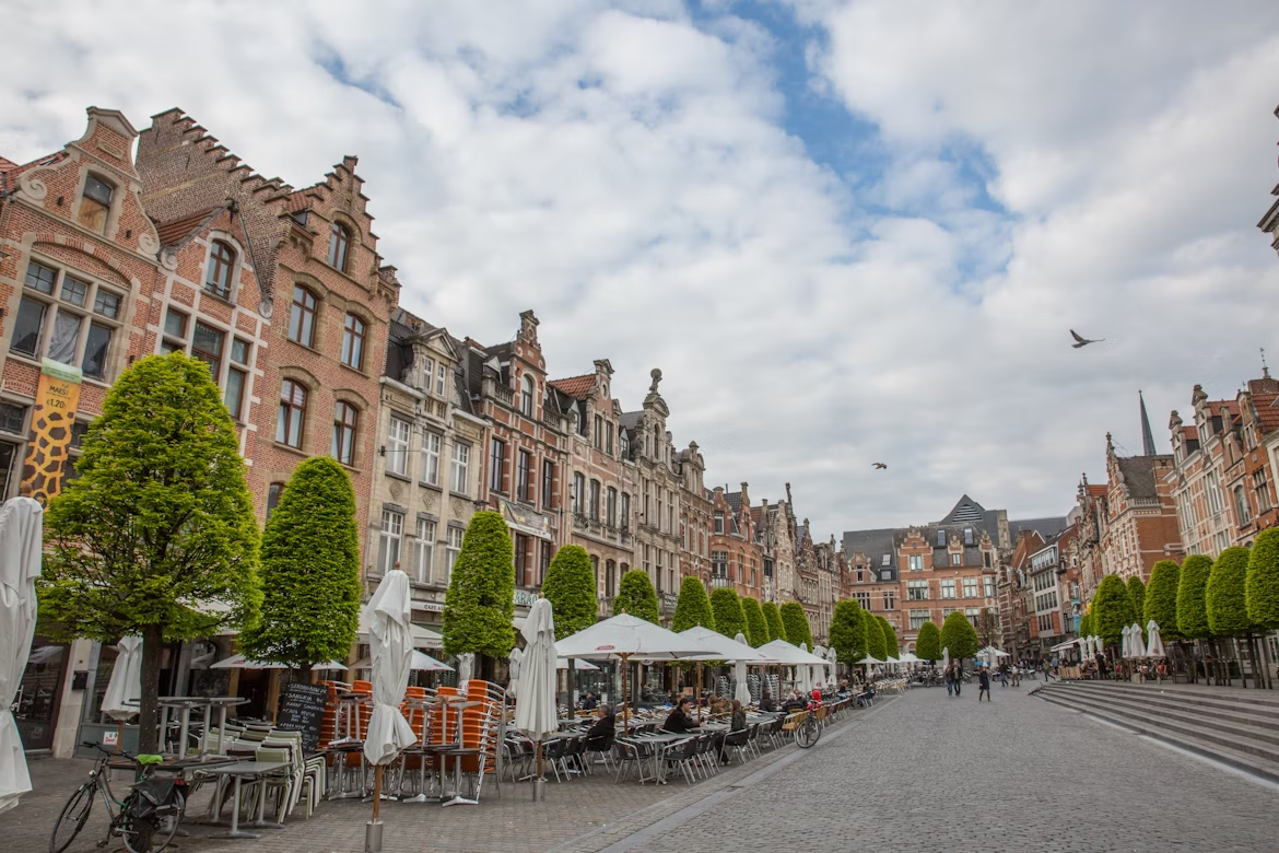 Outdoor cafés and historic buildings in Leuven's Oude Markt
