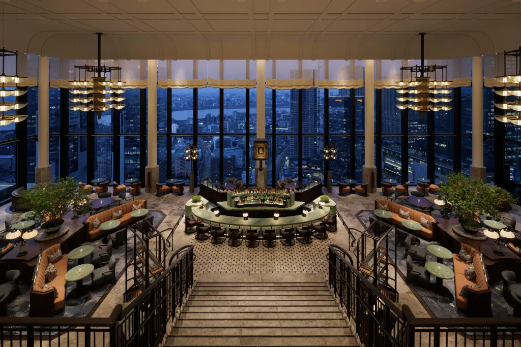 Peacock Alley lounge interior at Waldorf Astoria Osaka with city night view