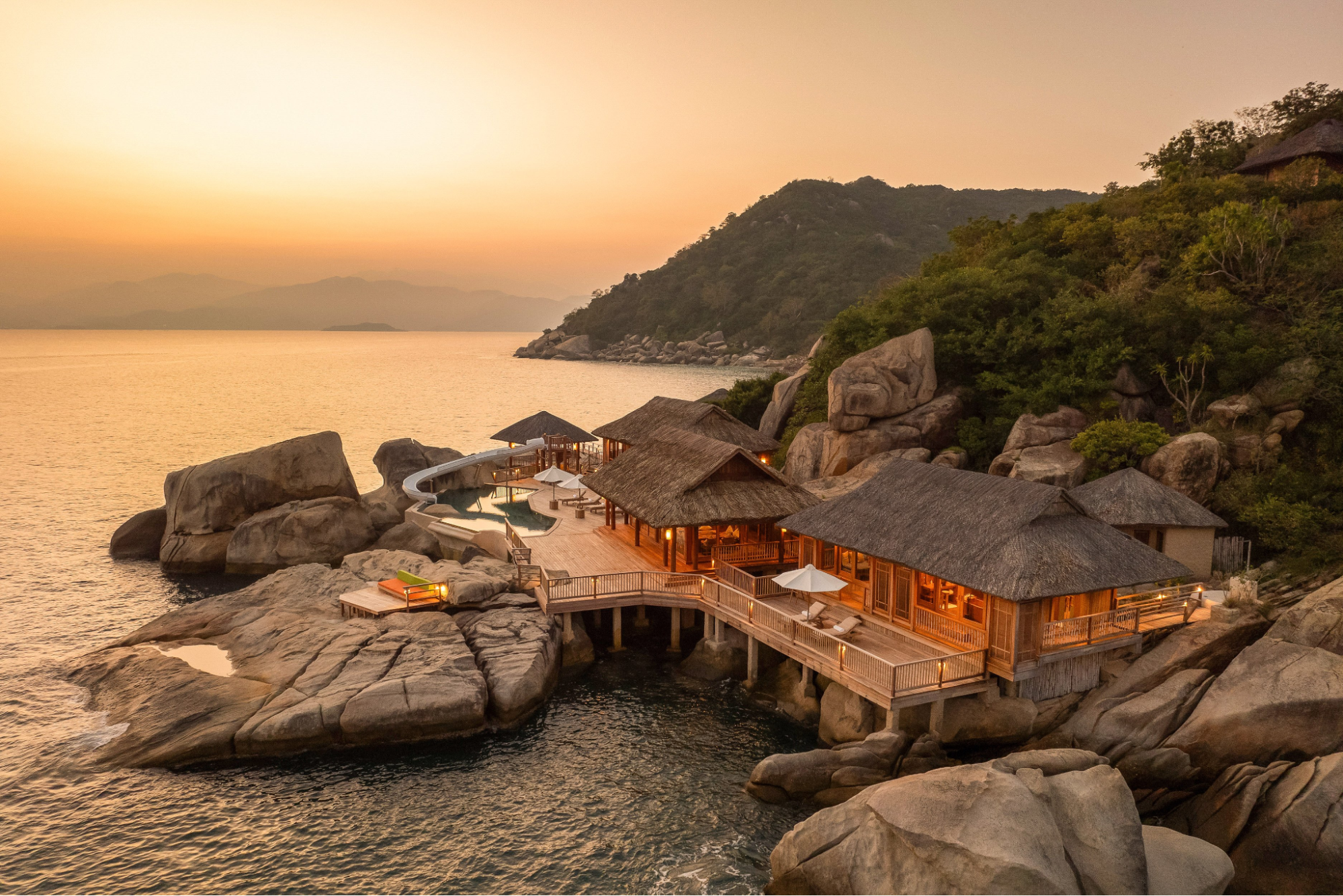 Luxury Seascape Residence at Six Senses Zil Pasyon overlooking the ocean at sunset