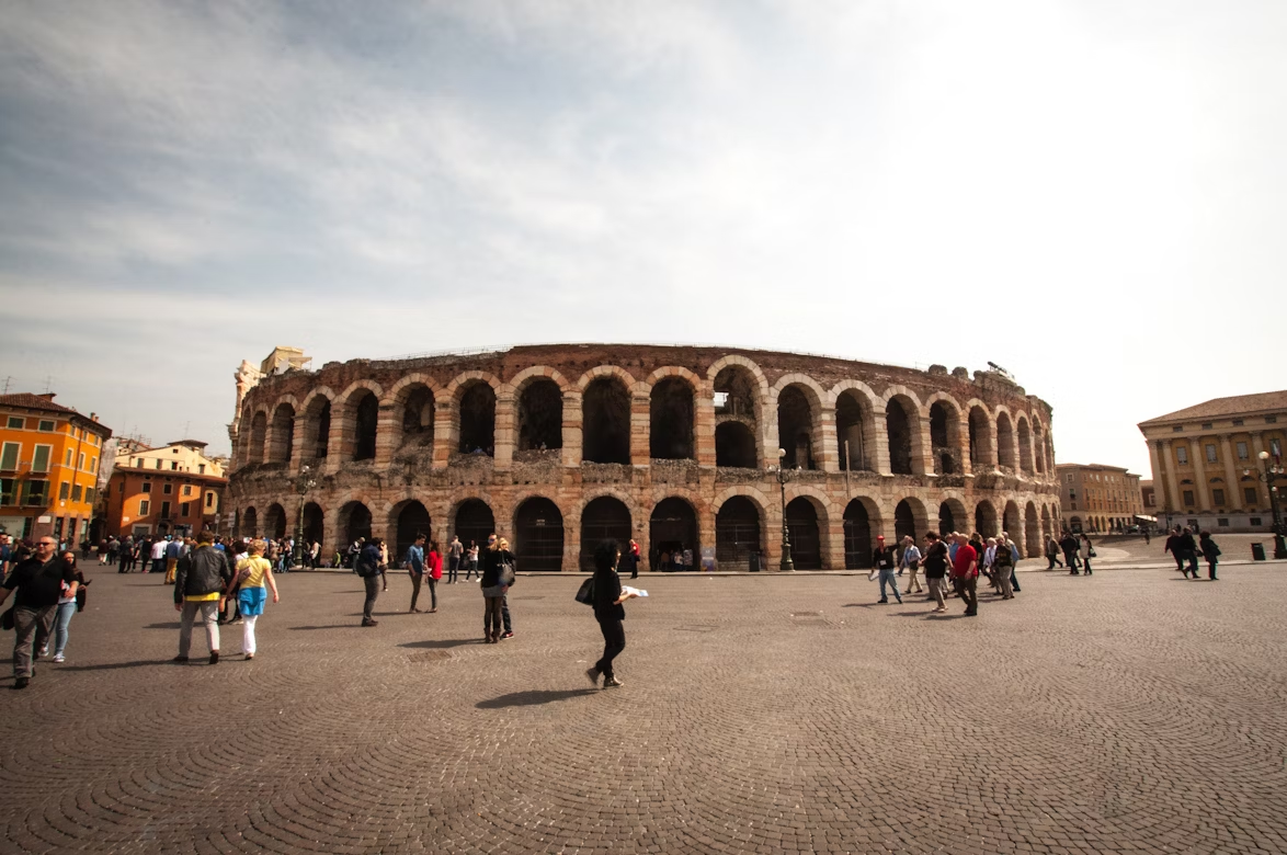 Roman amphitheatre Arena di Verona with tourists in front