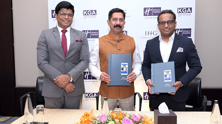 Executives from IHG Hotels & Resorts and KGA Group during the hotel agreement signing event in Changanassery