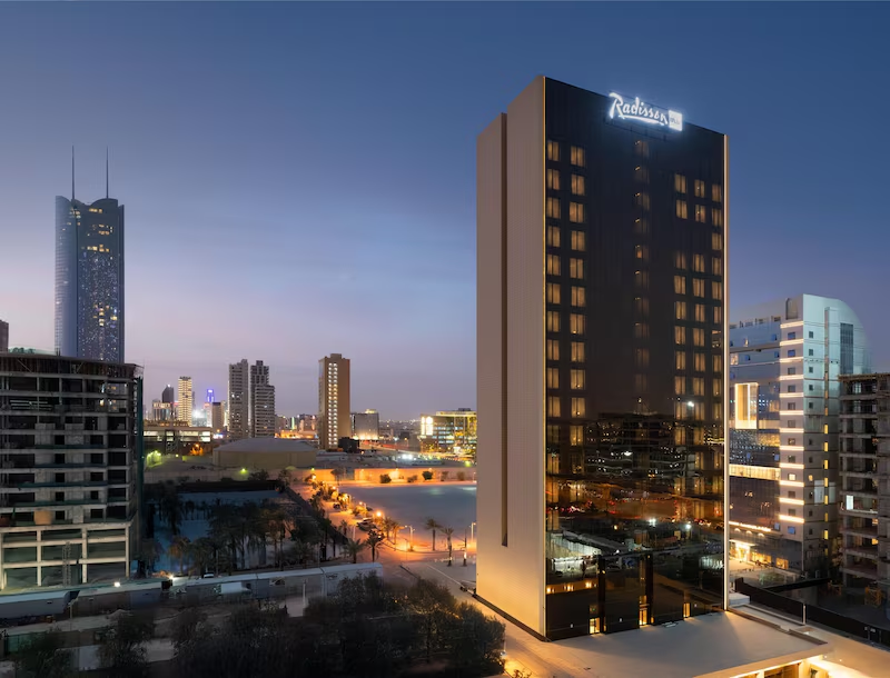 Radisson Blu Hotel Riyadh Al Sahafa building at dusk in northern Riyadh cityscape